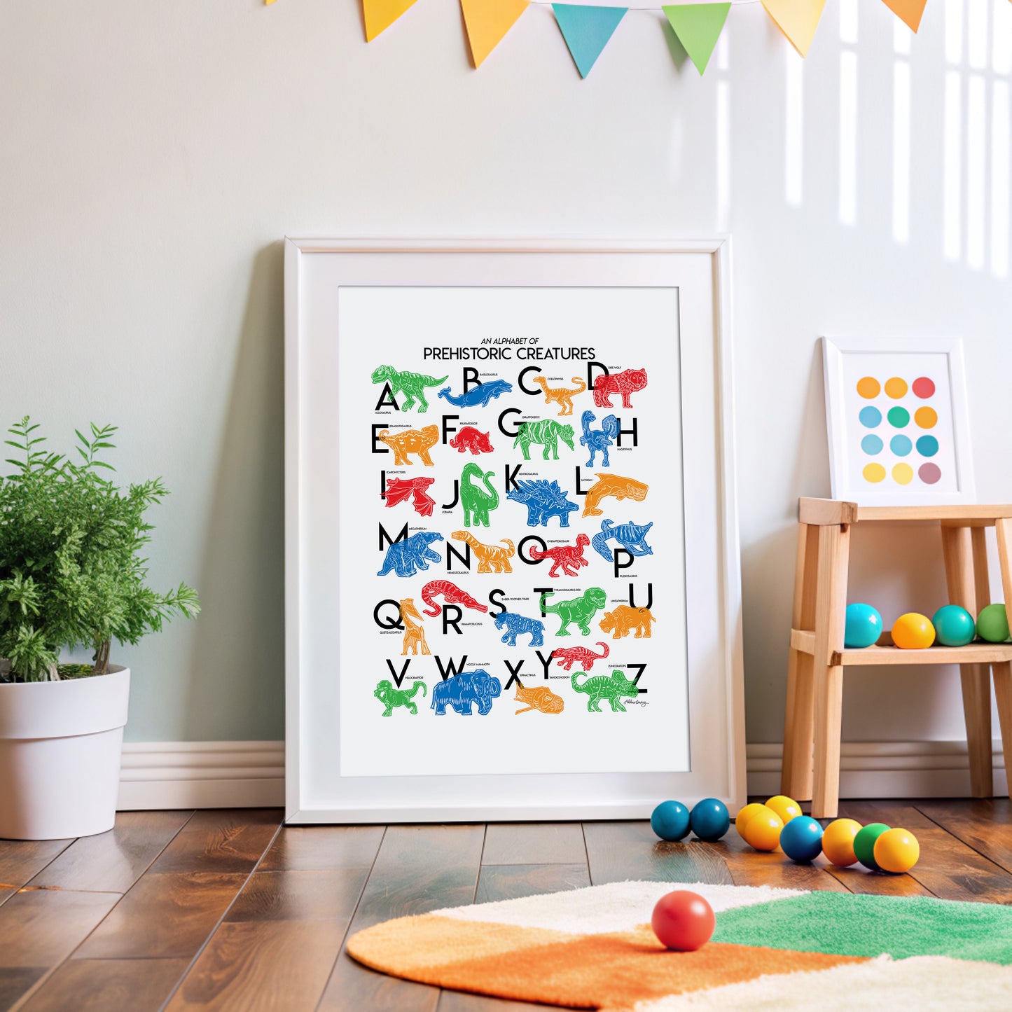 Colorful illustrated prehistoric creatures for every letter of the alphabet printed on a white background. Modern, slim text in black. Color palette is red, green blue, red and orange.