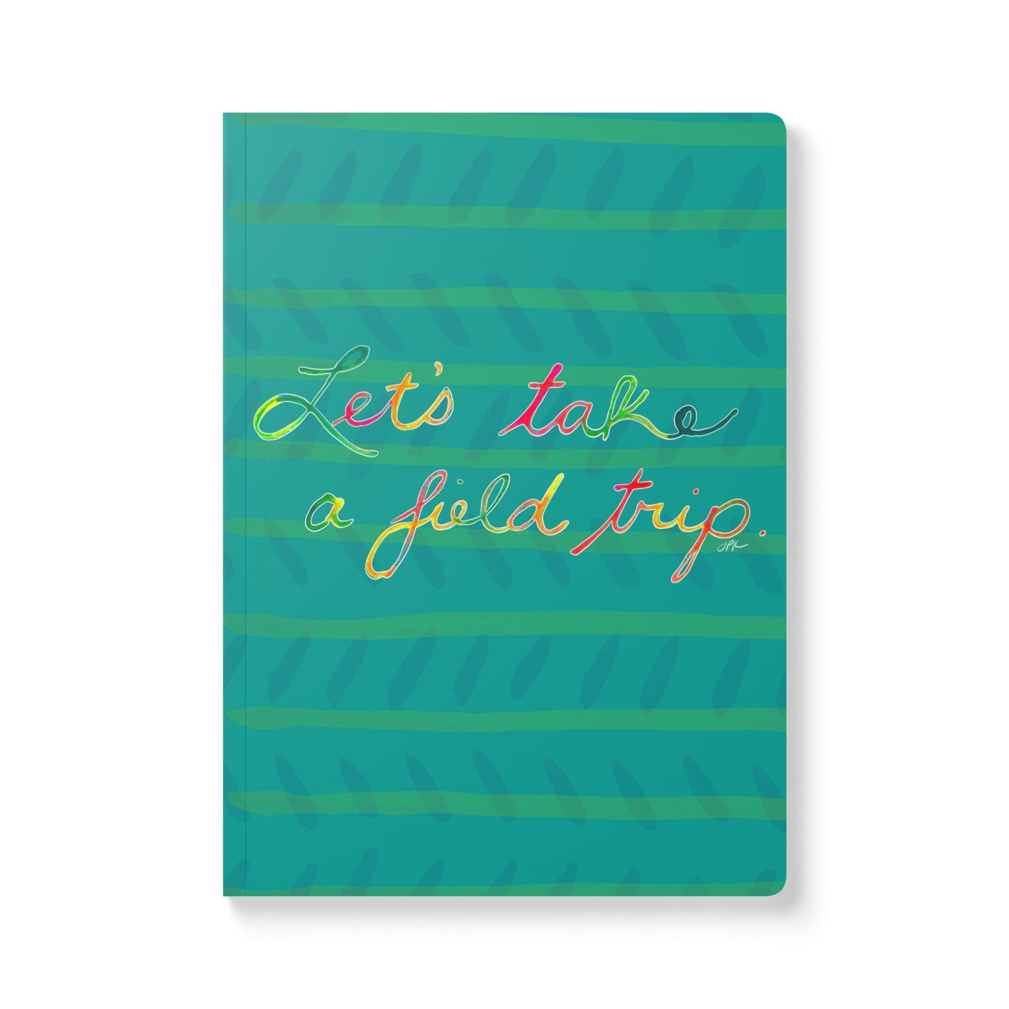 Hand written letters in neon colors decorate a painted dark teal cover saying “Let’s take a field trip.”