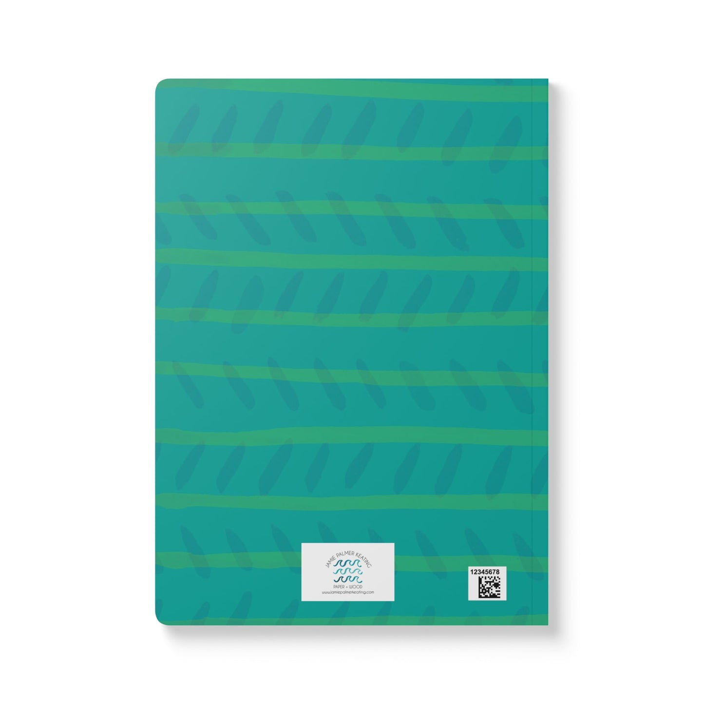 Dark teal back of journal with green and blue painted marks.