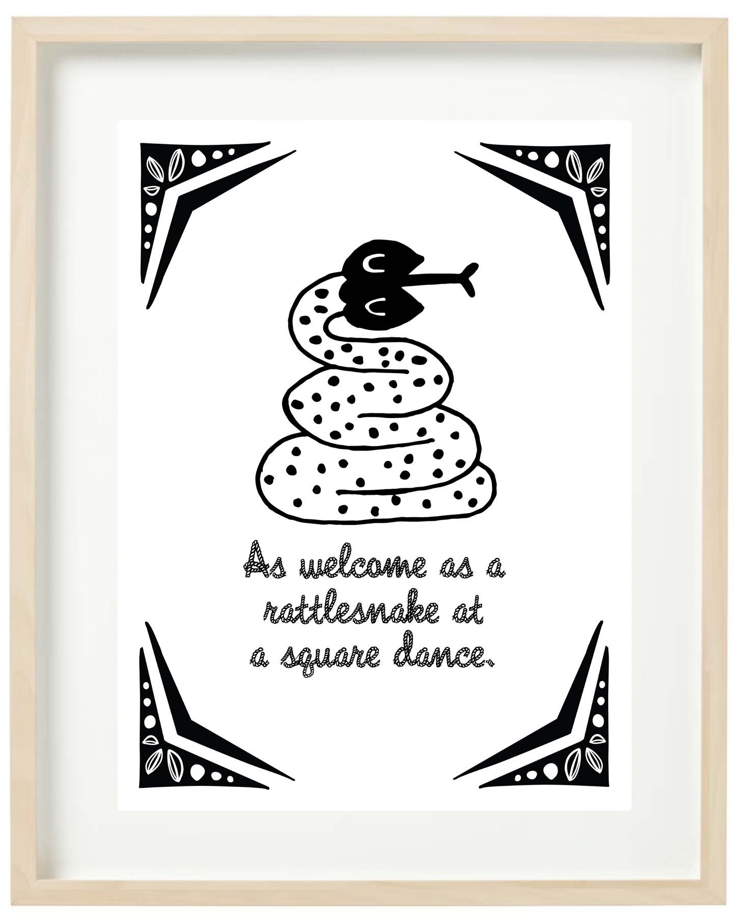 An illustrated rattle snake with friendly eyes and polka dots sits over a rope-style font that says “As welcome as a rattlesnake at a square dance.” Decorative corner design reminiscent of the wild west.