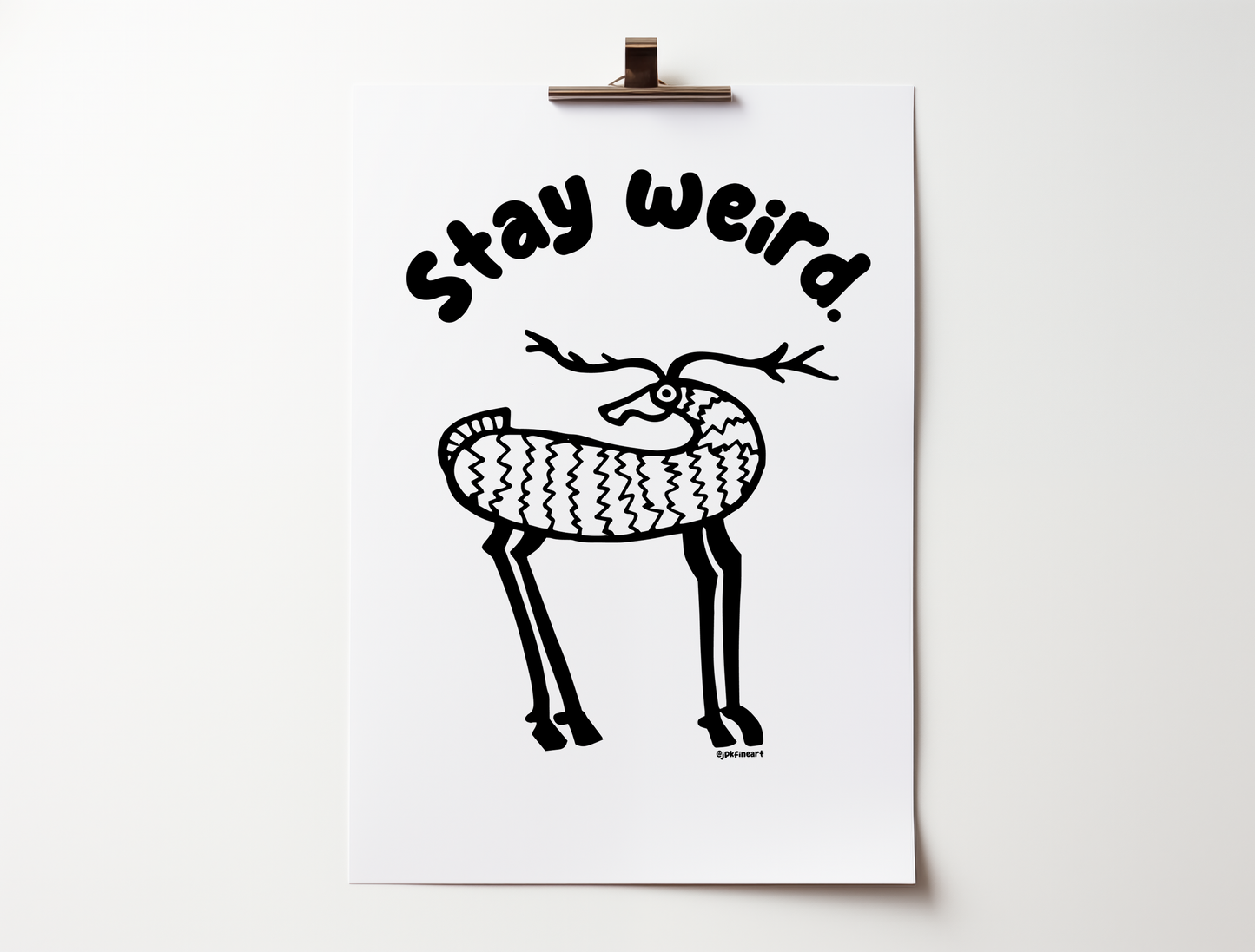 Handwritten bubble letters spelling out “Stay Weird” Illustrated deer character in black on a white background with clean lines. Inspired by the southwest and western United States.