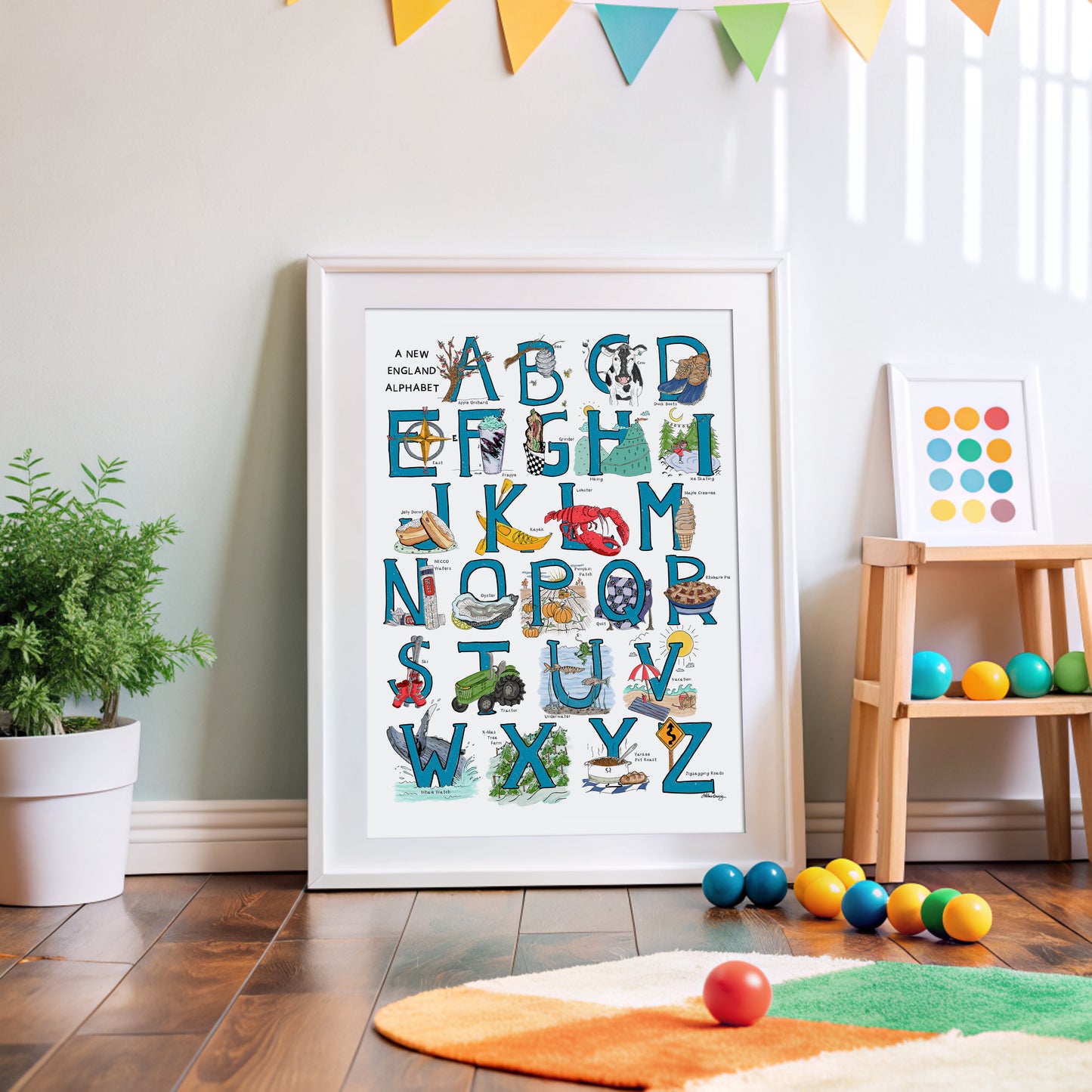 An illustrated alphabet of New England objects associated with each letter. Blue hand-drawn letters with colorful objects on a white background.