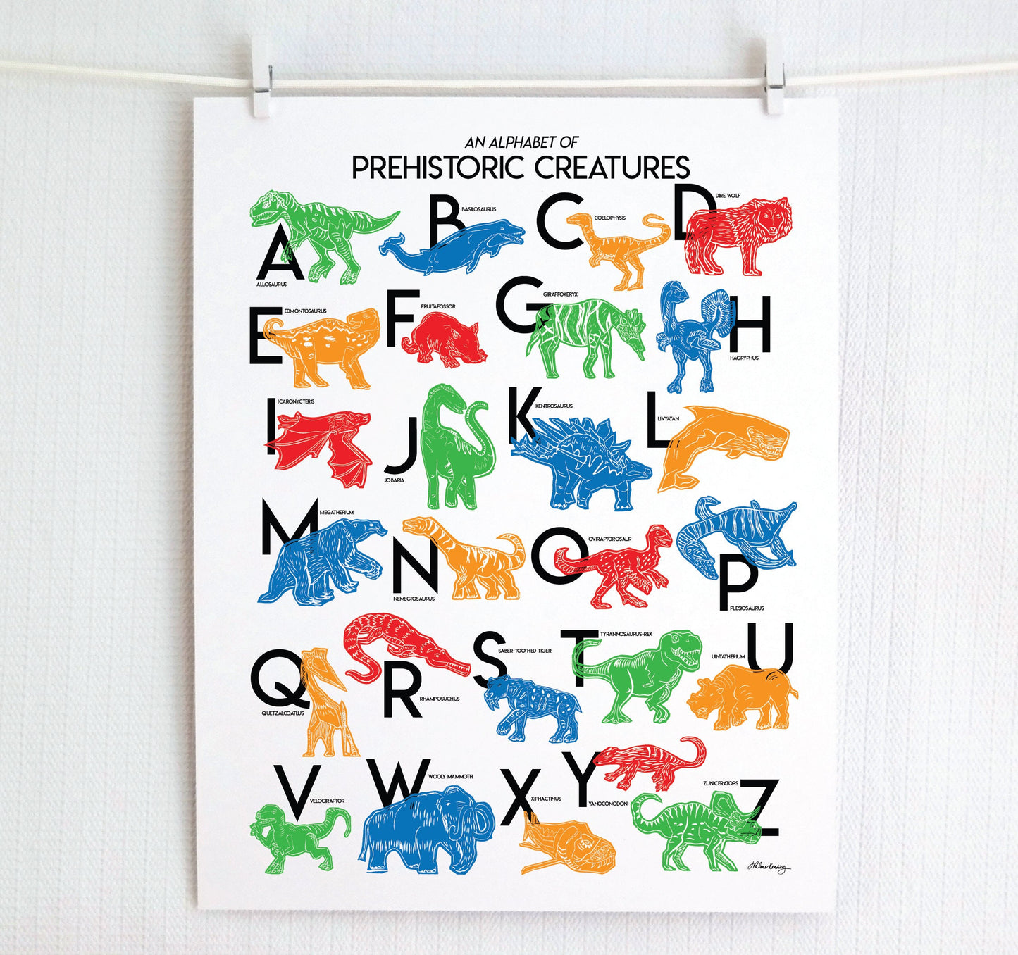 Colorful illustrated prehistoric creatures for every letter of the alphabet printed on a white background. Modern, slim text in black. Color palette is red, green blue, red and orange.