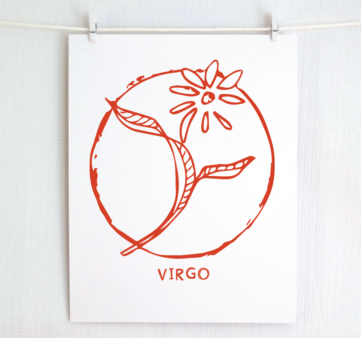 An illustration of the VIRGO Zodiac sign as a flower, printed on paper with the word ‘VIRGO’ at the bottom in red.