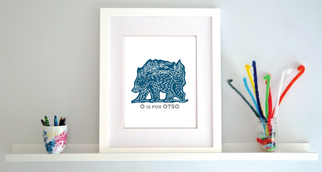 Friendly illustrated bear walking with the forest growing on his back. “O is for Otso” text in a gray block font below.