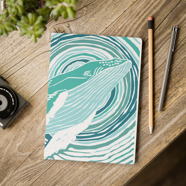 whale journal on a desk