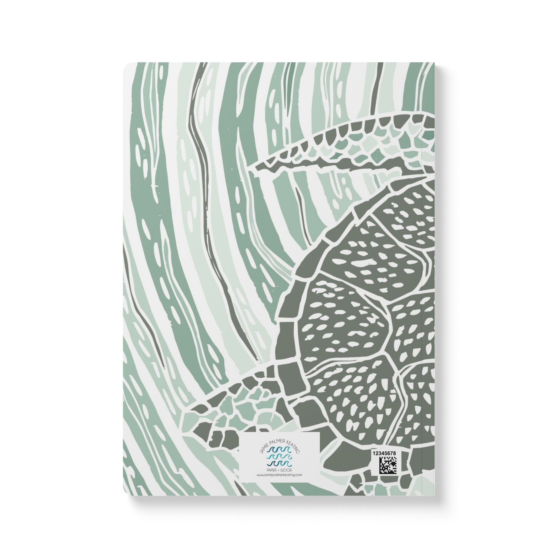 The back of the soft green sea turtle emerges over waves of greens.