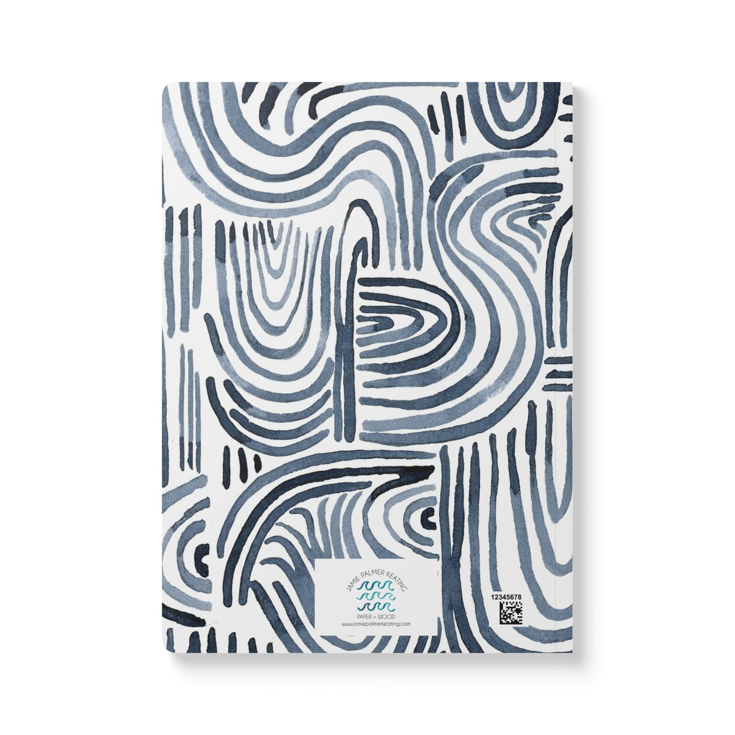 Indigo blue ink make hand-painting waves on a white cover.

