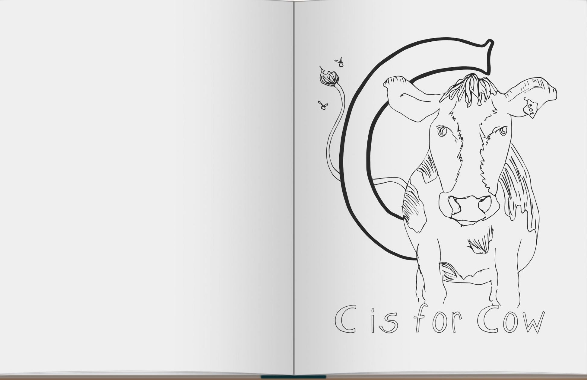 Open book with a black and white illustration of a cow and the letter 'C' on a white background.