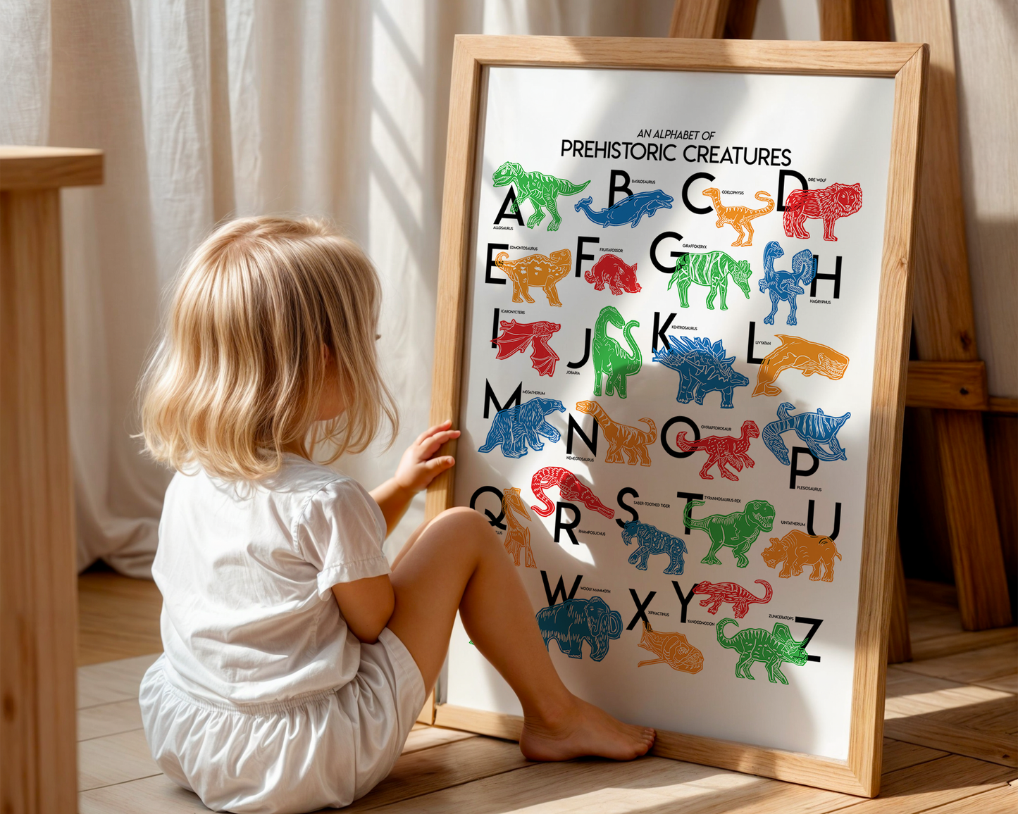 Colorful illustrated prehistoric creatures for every letter of the alphabet printed on a white background. Modern, slim text in black. Color palette is red, green blue, red and orange.
