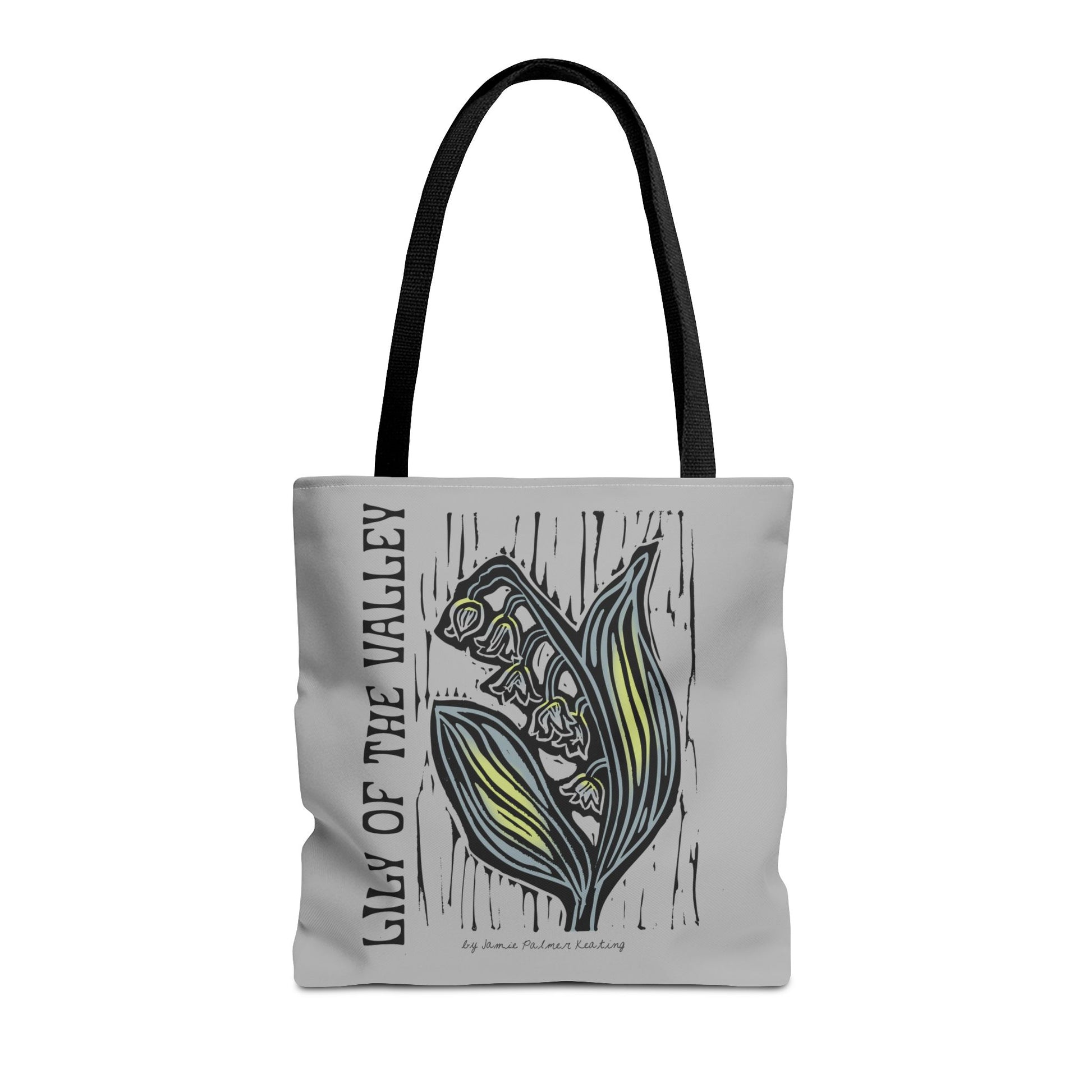 Tote bag with floral design and text on a white background