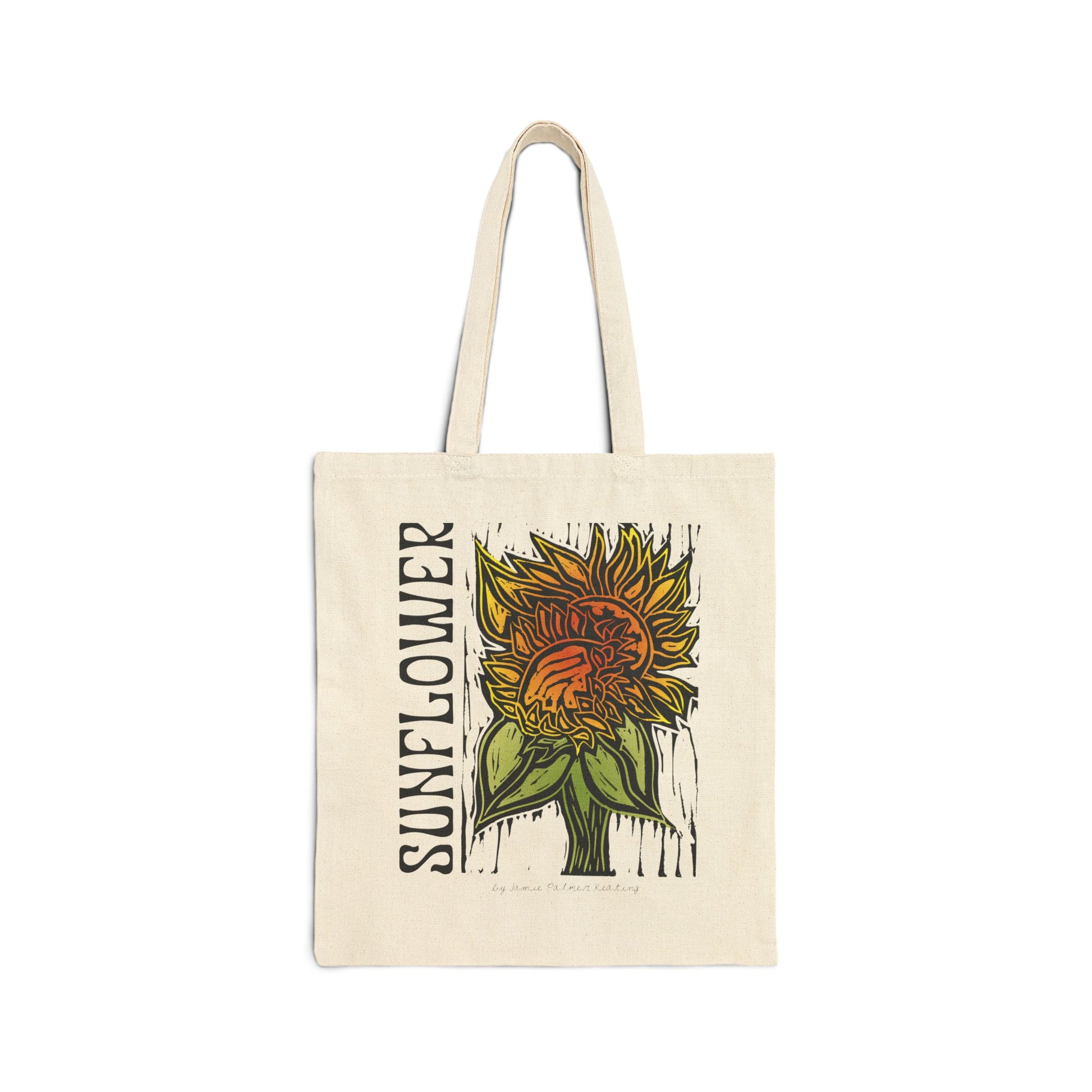 Tote bag with sunflower design and text on a white background