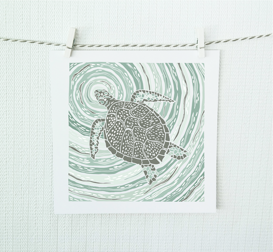 Illustration of a turtle on a wavy green background, hanging on a string against a light background.