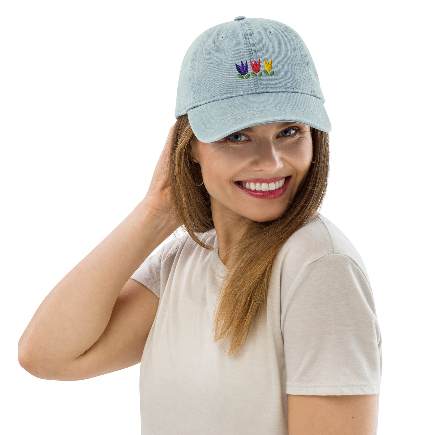 Tulip design on denim hat worn by woman with long hair