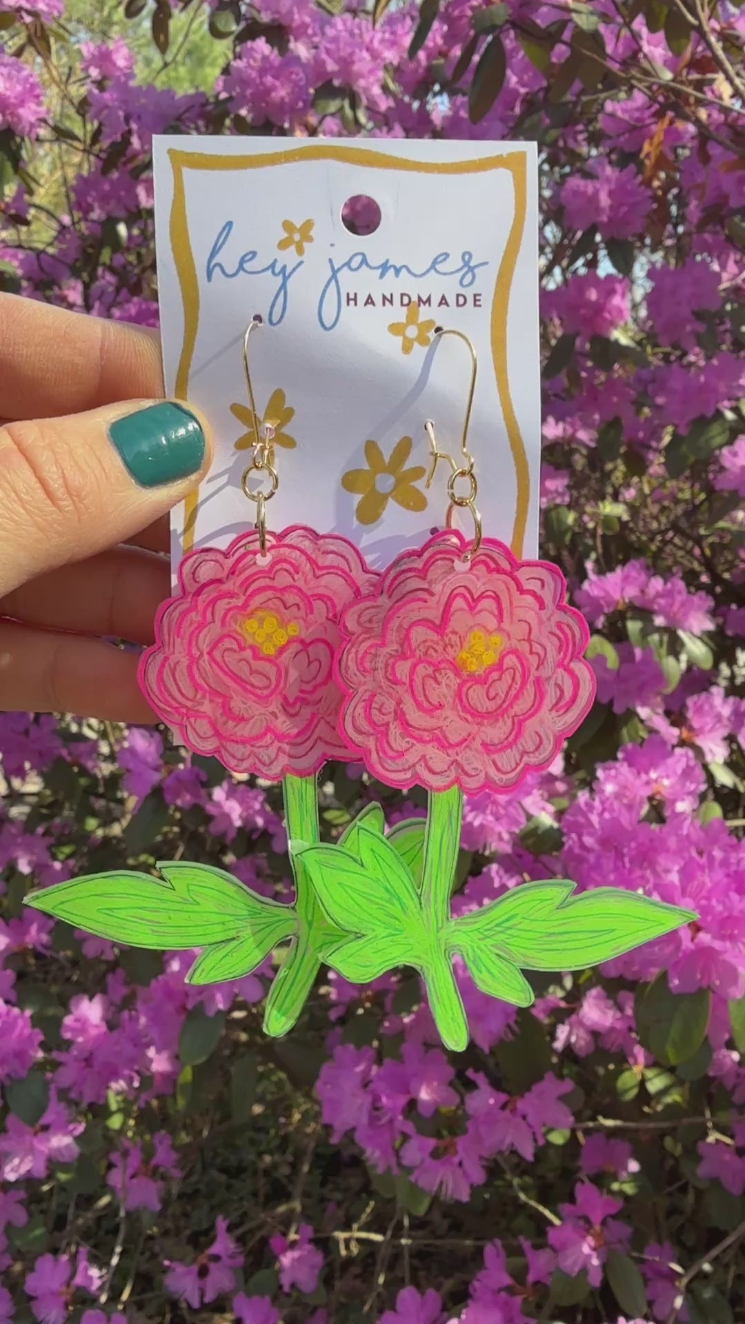 Pink peony flowers swaying on printed card