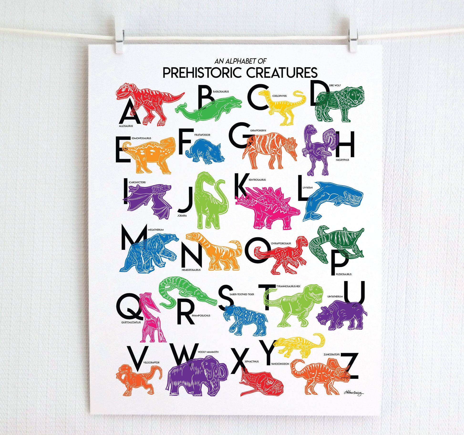 Colorful illustrated prehistoric creatures for every letter of the alphabet printed on a white background. Modern, slim text in black. Color palette is red, lime green, dark green, light blue, red, orange, pink and purple.
