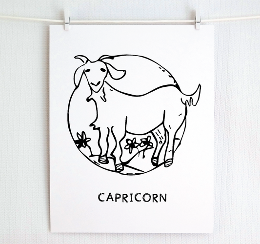 An illustration of the CAPRICORN Zodiac sign as a goat, printed on paper with the word ‘CAPRICORN’ at the bottom.